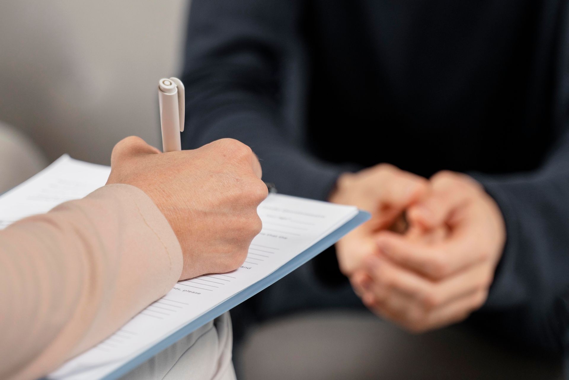 Image of psychologist and man patient at consultation.